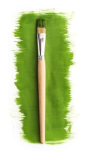 Brush for paint. Isolated on grass green background over white background. Brush strokes - Yarnell School Online.